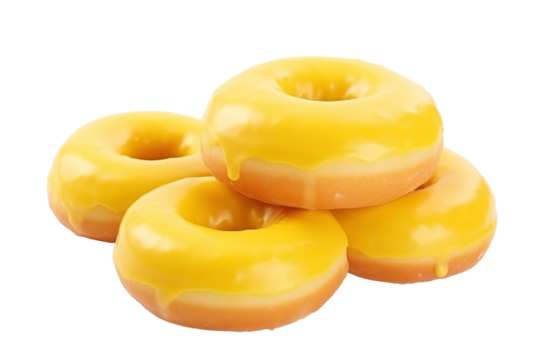 a group of donuts with yellow frosting