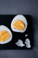 Boiled egg on a black stand