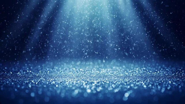 Luxurious beautiful dark blue navy bokeh light effect background with shimmer, particles falling down, ight god rays, abstract glitter lights. Product Scene Mockup or Christmas background		