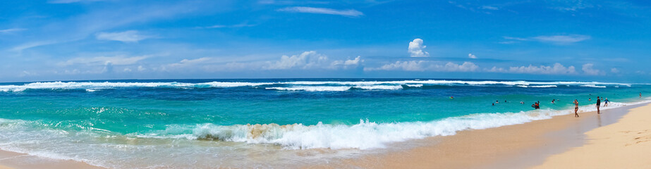 Melasti Beach is beautiful with white sand and blue sea water
