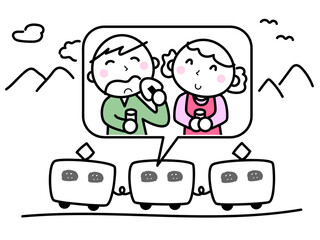 電車で旅行する男女