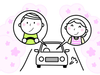 桜並木をドライブする男女