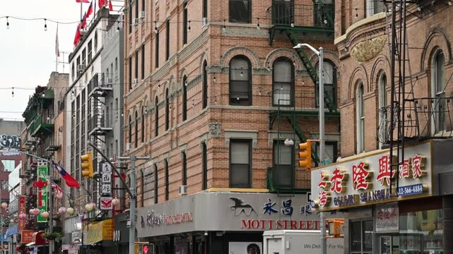New York, USA, August 17, 2024. Panoramic footage in the heart of the Chinatown neighborhood. Colorful paper lanterns and Chinese signs, exploring the city.
