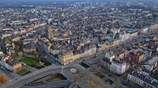 Pont de Bretagne bridge, Place de Bretagne, Quai Saint Cyr, La Vilaine, Saint Pierre cathedral and Town Hall with Opera in background, Rennes city, France. Aerial backward