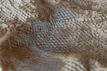 Honeycomb Environmental friendly paper hexagonal shape made of cardboard recycled craft brown paper background lightweight bubble wrapping strength for protective packaging with space white background