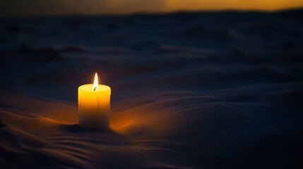 Single Candle on Sandy Beach at Sunset Peaceful Night Scene