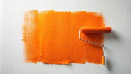 Obraz premium A close-up of a paint roller leaving a bright orange stripe on a white wall.