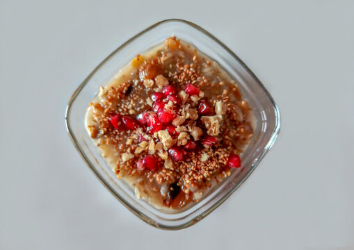 Ashure dessert with legumes and dried fruits named aşure or asure . Noah&rsquo;s pudding in the bowl.
