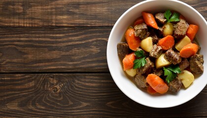 Beef meat stewed with potatoes, carrots and spices