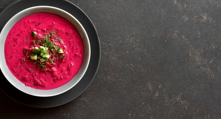 Beet cream soup with yogurt, cucumbers and dill