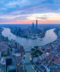 Aerial View of Shanghai skyline at sunrise with the Winding River