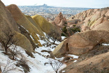 Rock formations of the Red Valley (Valley of Roses), Cappadocia, Turkey , in winter.