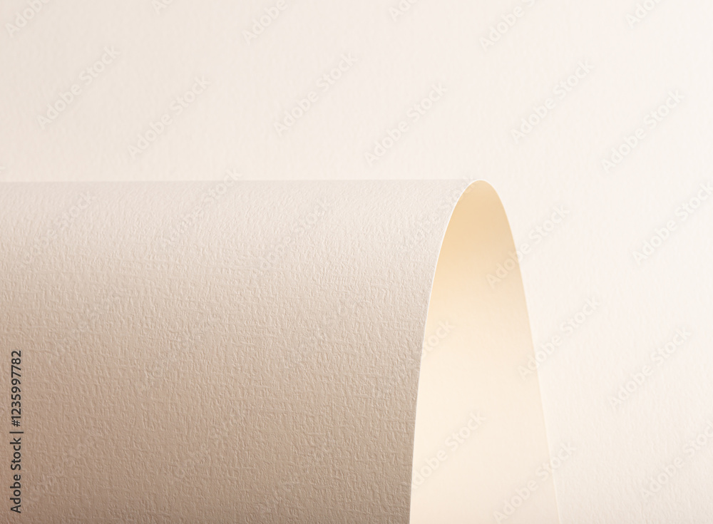 Poster A beige paper background with a textured surface, featuring gentle curves and arching folds. The soft tones, neutral hues, and interplay of light and shadows create a natural and warm aesthetic. Its