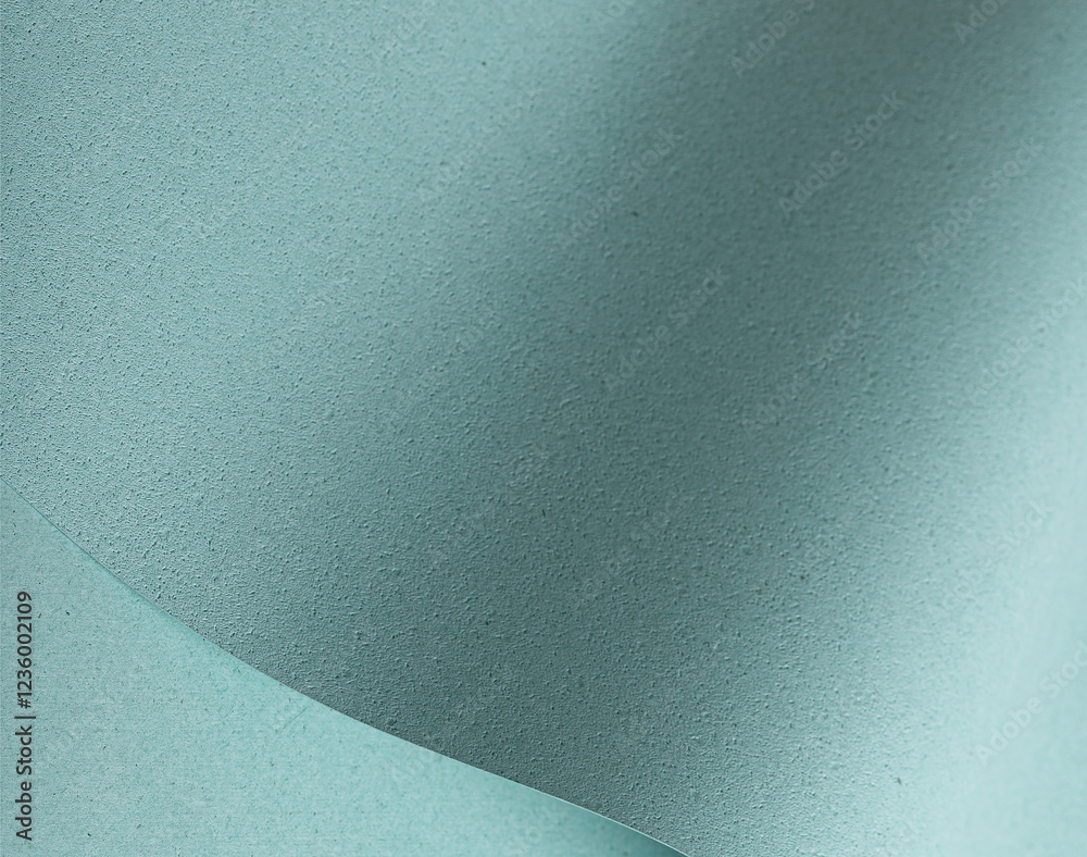 Fototapete a pastel blue textured paper background featuring punched and perforated details, enhanced by soft s