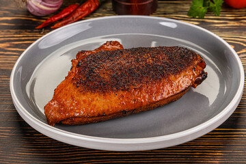 Roasted duck breast in cherry