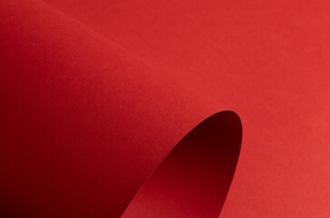Red paper background with a matte texture and soft tones. Bold ruby and crimson hues create a stylish, elegant, and modern surface with a clean, decorative pattern.