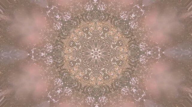 V&iacute;deo 4k de mandala con patr&oacute;n de repetici&oacute;n de varios movimientos cambiantes en tonos marrones,ocre,rojo, amarillo