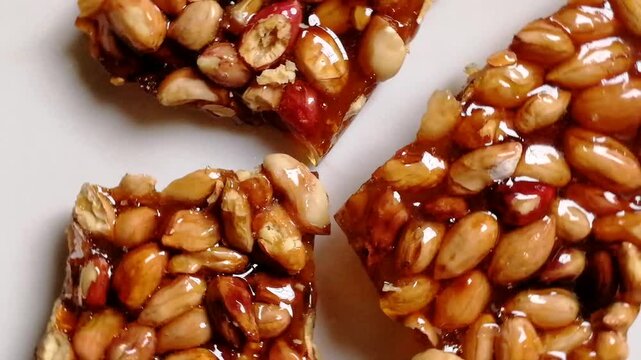 Crystal honey and caramel mixed peanut bar for presentation, advertising and reference. Most tasty item for boosting body energy
