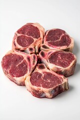 Obraz premium A close-up shot of a bunch of raw meat on a white surface, often used for cooking or presentation