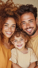 Obraz premium Happy family portrait with smiling caucasian parents and child
