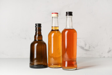 Bottles of rum on white background