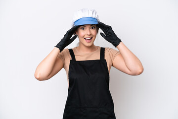 Fishmonger brazilian woman wearing an apron isolated on white background with surprise expression