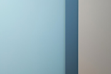 Minimalist blue-gray wall with sharp dividing shadow line
