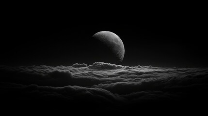 The moon is partially obscured by clouds, with the glowing edges of the moon shining through in sharp, clear detail. The dark, almost black sky contrasts with the moon's bright
