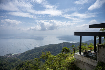 A view over Lake Taal and the Taal Volcano, from Tagaytay City, the Philippines. Haze in the sky