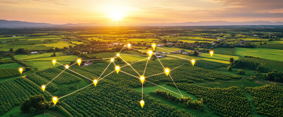 Aerial view of a lush farm landscape at sunset with a network of glowing location pins, symbolizing connectivity and modern agriculture in a digital world.