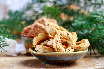 Cookies with grains and herbs in the shape of miniature pretzels. Homemade recipe.