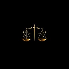 Golden scales logo isolated on black background