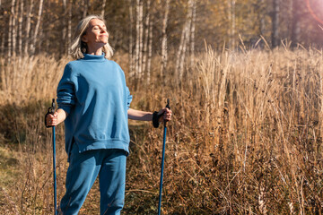 Fototapeta premium Female with Backpack on Hike in nature