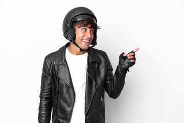 Young man with a motorcycle helmet isolated on white background intending to realizes the solution while lifting a finger up