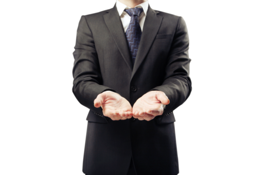 Closeup of a man in a suit with open palms outstretched, isolated on a white background. Concept of offering, giving, or receiving
