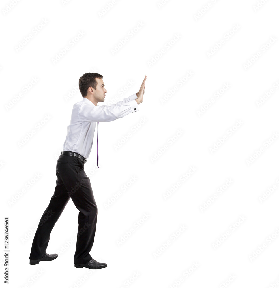 Poster A man in formal attire, appearing to push an invisible object with both hands, isolated on a white background. Concept of effort or resistance