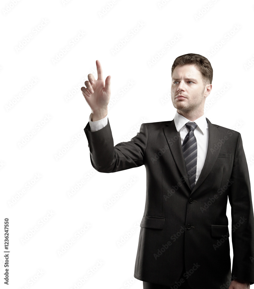Aufkleber professional businessman in a formal suit pointing forward with a focused expression, isolated on a 