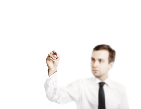 Businessman in white shirt holding a marker pen, writing on an invisible surface. Blurred face, isolated on a white background. Concept of planning