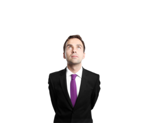 Businessman in asuit with a purple tie gazing upward. Isolated on a clean white background. Concept of aspiration and professionalism