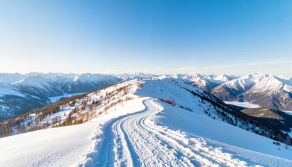 Snowy mountain trail under clear blue sky, winter adventure