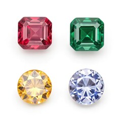 Fototapeta premium Set of four different colorful gemstones on a white background