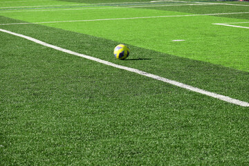 ball on artificial green grass, playground for soccer