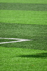 Obraz premium artificial green grass background for playground