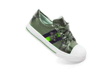 Green sneakers on white background, sports shoes, running shoes, comfortable shoes