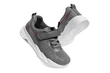 Gray sneakers on white background, sports shoes, running shoes, comfortable shoes
