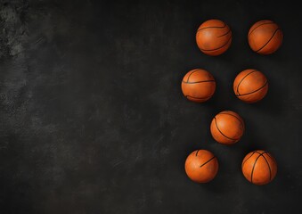 Fototapeta premium Basketball Balls Arranged on a Dark Background