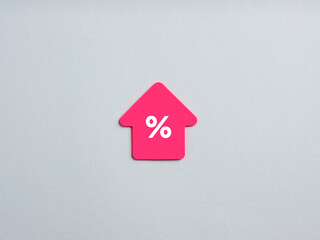 Interest rate increase concept. Arrow shaped note paper with the percentage symbol.