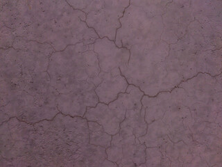 An old gray wall with cracks. Grey vintage background with damage. Grey texture.