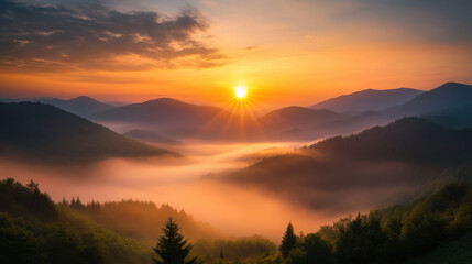 Obraz premium breathtaking sunrise over misty mountains, showcasing vibrant colors and serene landscapes. sun rises above horizon, illuminating fog covered valleys and creating peaceful atmosphere