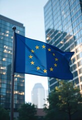 Flag of European Union waving in the wind in front of the modern buildings on sunny day. Europe Day. European Parliament elections, European Union Summits, G20 Summit. Future of Europe